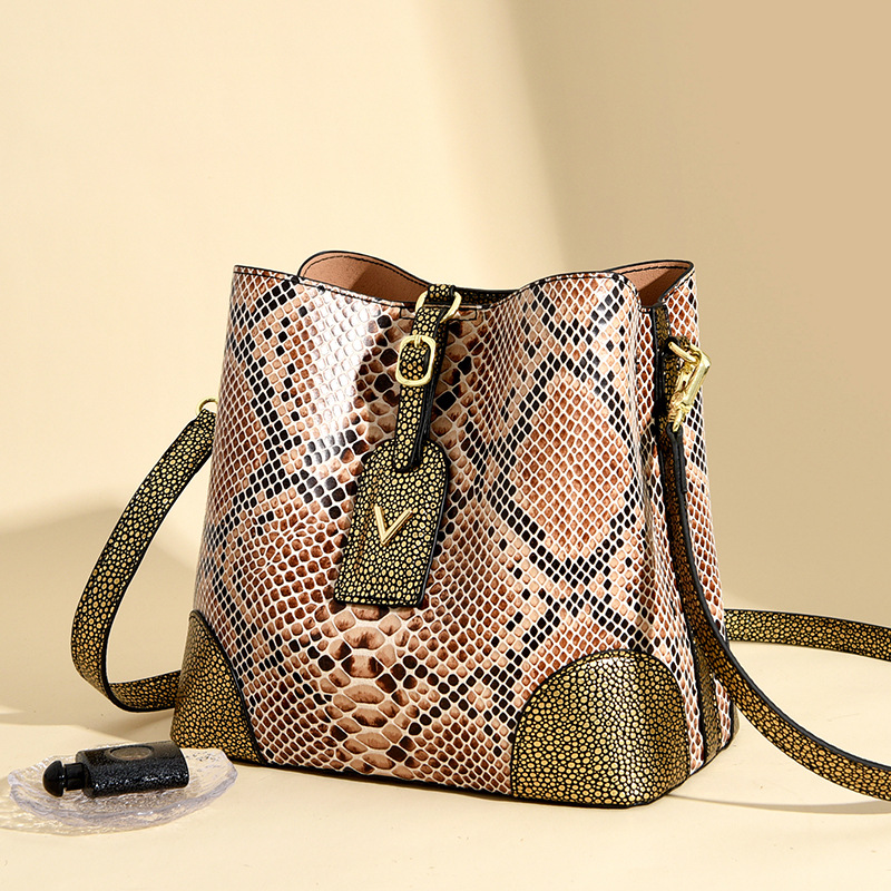 Luxury Bags Sell - Somenie 売れ筋プレミアムテクスチャースネークパターンバケットバッグ女性用 2026 新しいライトラグジュアリーニッチポータブルショルダーメッセンジャーバッグ